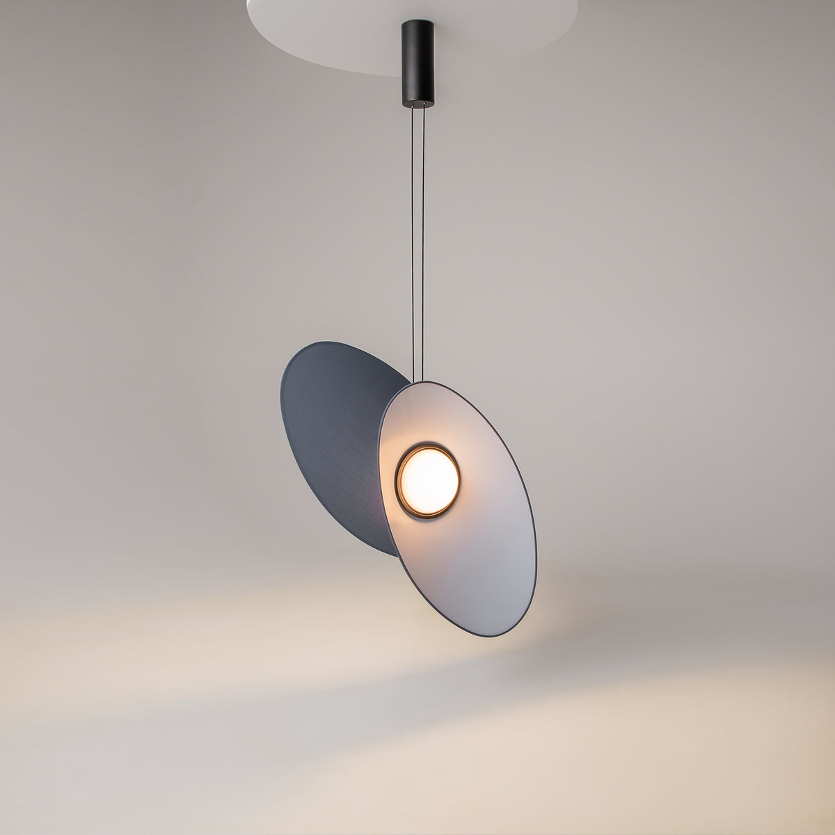 Evolution LED pendant light illuminated in an interior